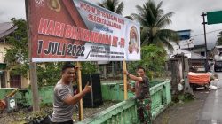 Bangun Sinergitas TNI- Polri, Kodim 0116/Nagan Raya Pasang Spanduk HUT Bhayangkara Ke 76