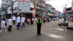 Sat Lantas Polres Tanjung Balai Kawal Jalan Sehat Ceria Bersama Muda Mudi Persadabumi Vihara Bhakti Maitreya